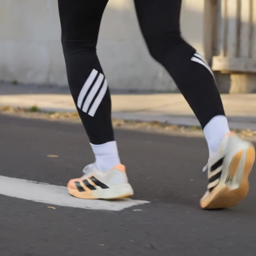 Adidas Women's ADIZERO ADIOS PRO 4 RUNNING SHOES - Acid Orange / Core Black / Crystal White - Image 2