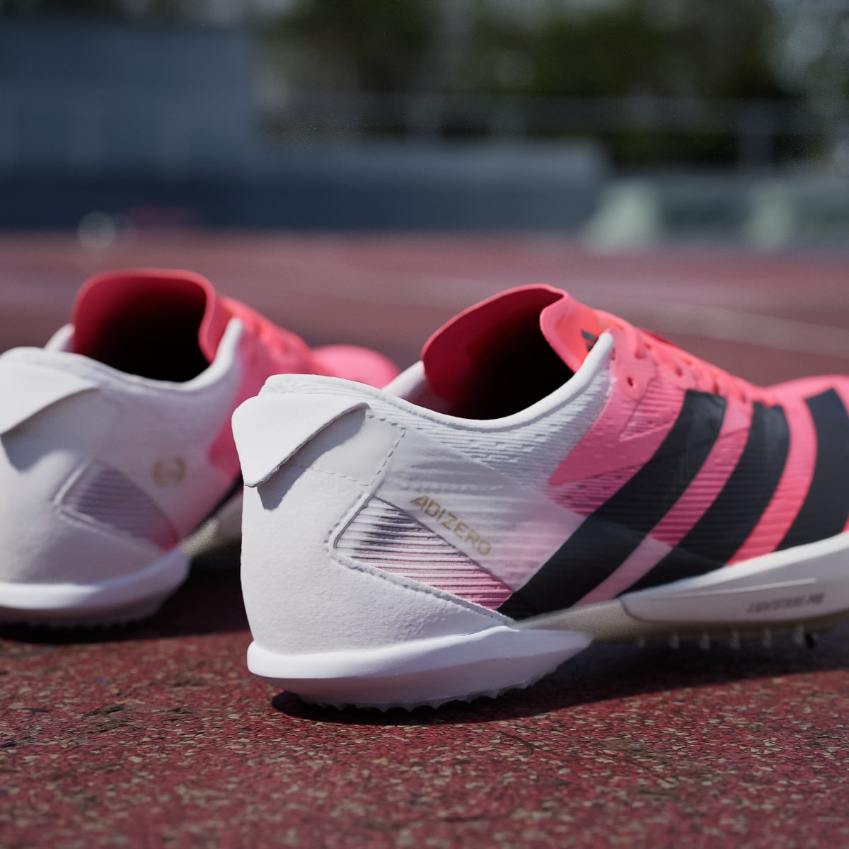 Adidas Women's ADIZERO AMBITION Shoes - Solar Turbo / Core Black / Gold Metallic - Image 10