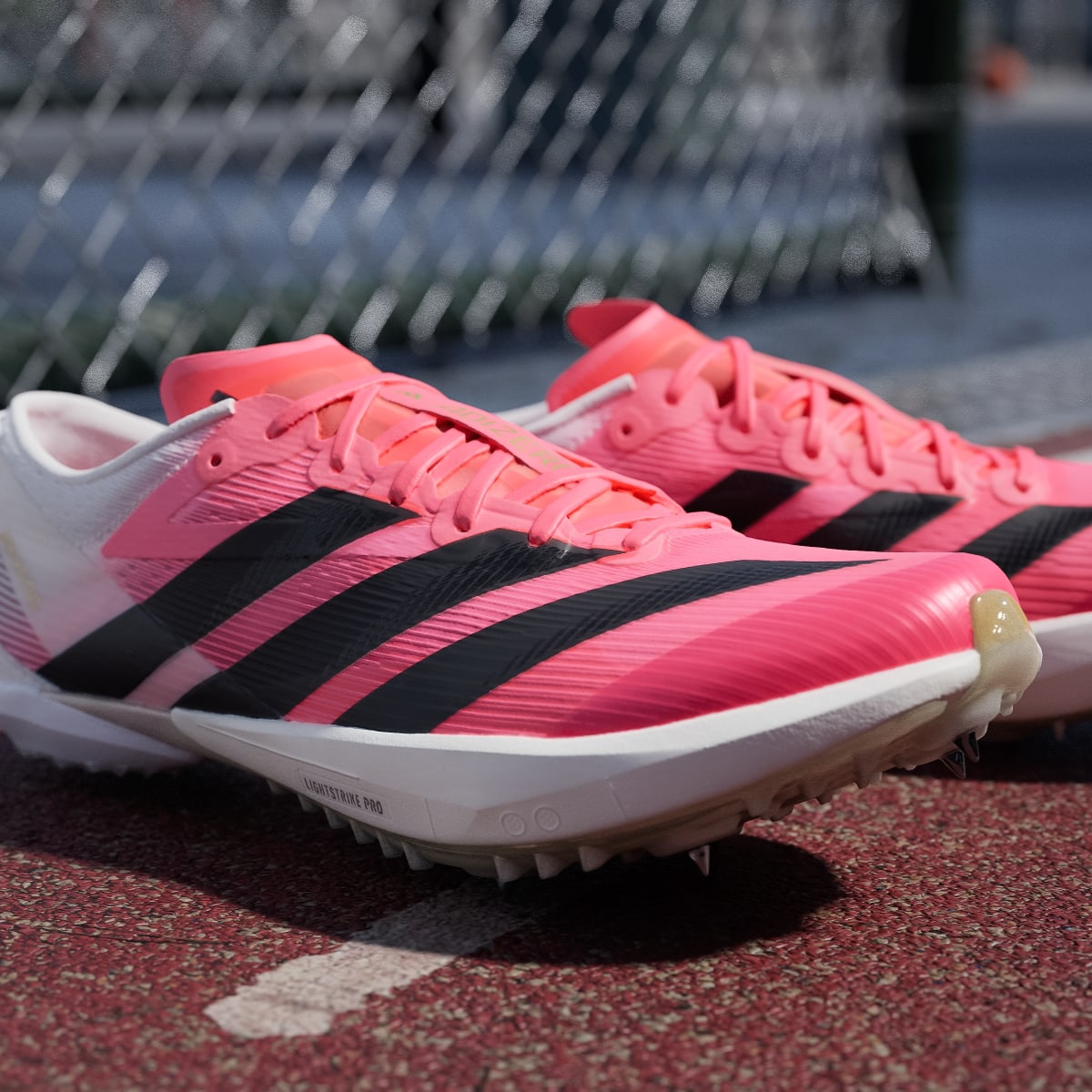 Adidas Women's ADIZERO AMBITION Shoes - Solar Turbo / Core Black / Gold Metallic - Image 9