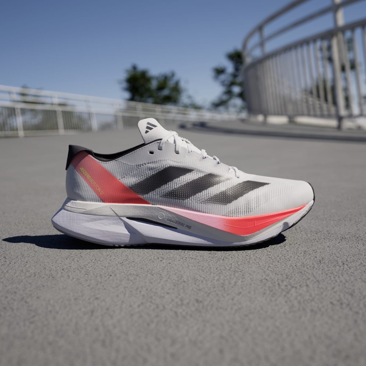 Adidas Men's Adizero Boston 12 Shoes - Cloud White / Aurora Met. / Solar Red - Image 3