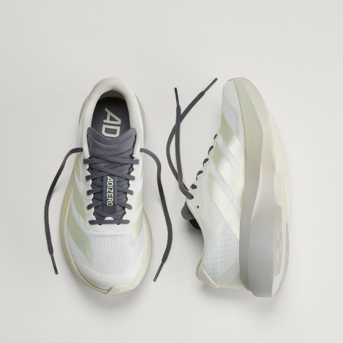 Adidas Women's Adizero EVO SL Shoes - Off White / Ice Gold Met. / Granite - Image 4