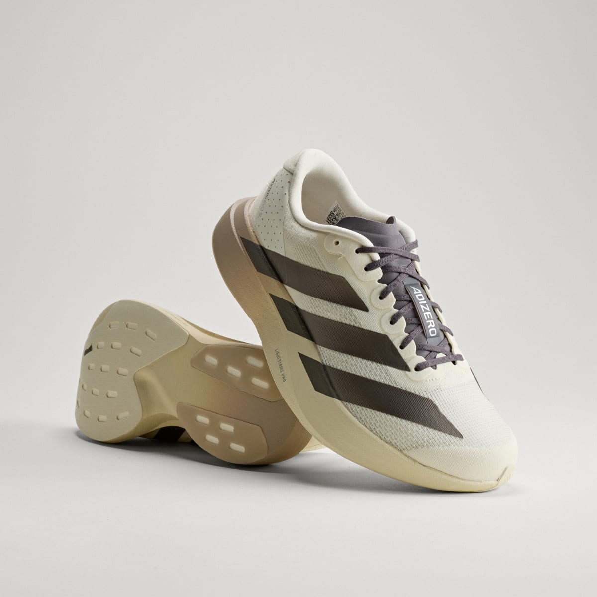 Adidas Men's Adizero EVO SL Shoes - Off White / Aurora Coffee Met. / Matte Silver - Image 1