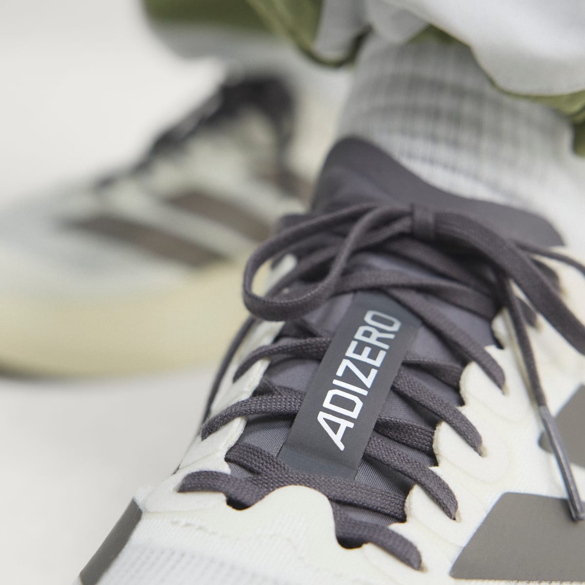 Adidas Men's Adizero EVO SL Shoes - Off White / Aurora Coffee Met. / Matte Silver - Image 8