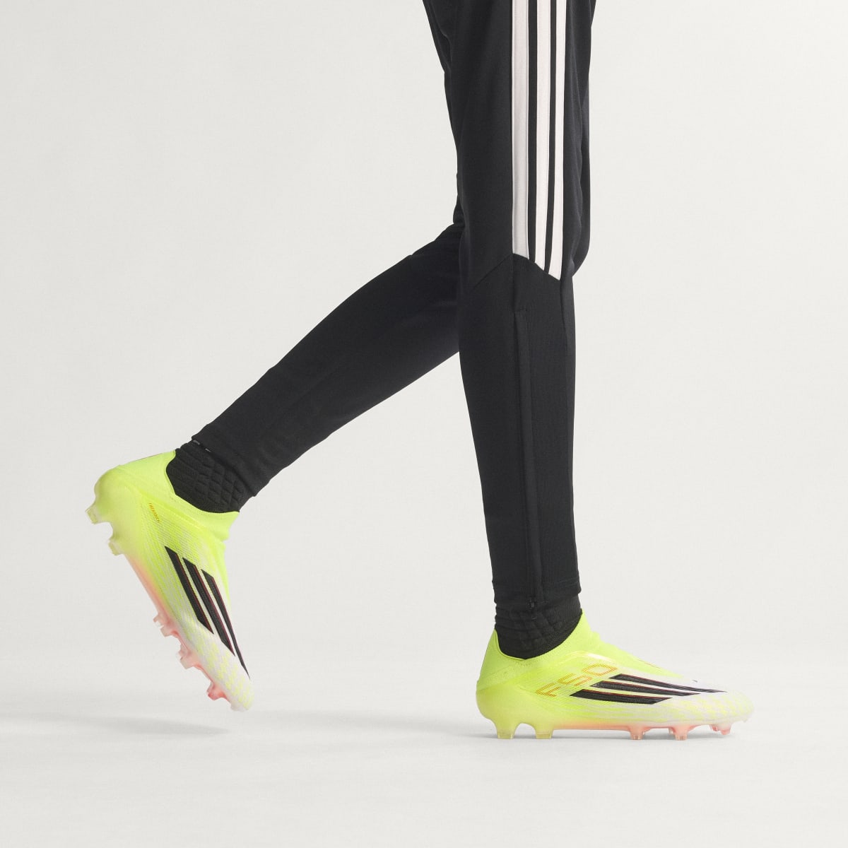 Adidas Men's F50 ELITE Laceless Firm Ground Soccer Cleats - Team Solar Yellow 2 / Core Black / Lucid Red - Image 2