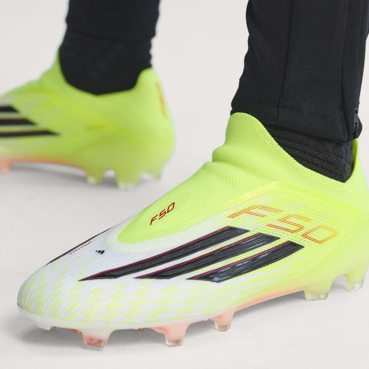 Adidas Men's F50 ELITE Laceless Firm Ground Soccer Cleats - Team Solar Yellow 2 / Core Black / Lucid Red - Image 6