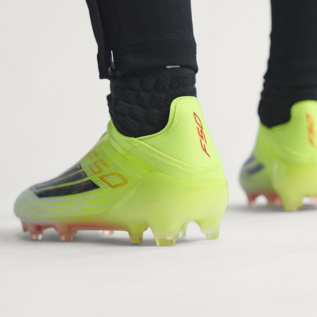 Adidas Women's F50 ELITE Laceless Firm Ground Soccer Cleats - Team Solar Yellow 2 / Core Black / Lucid Red - Image 7