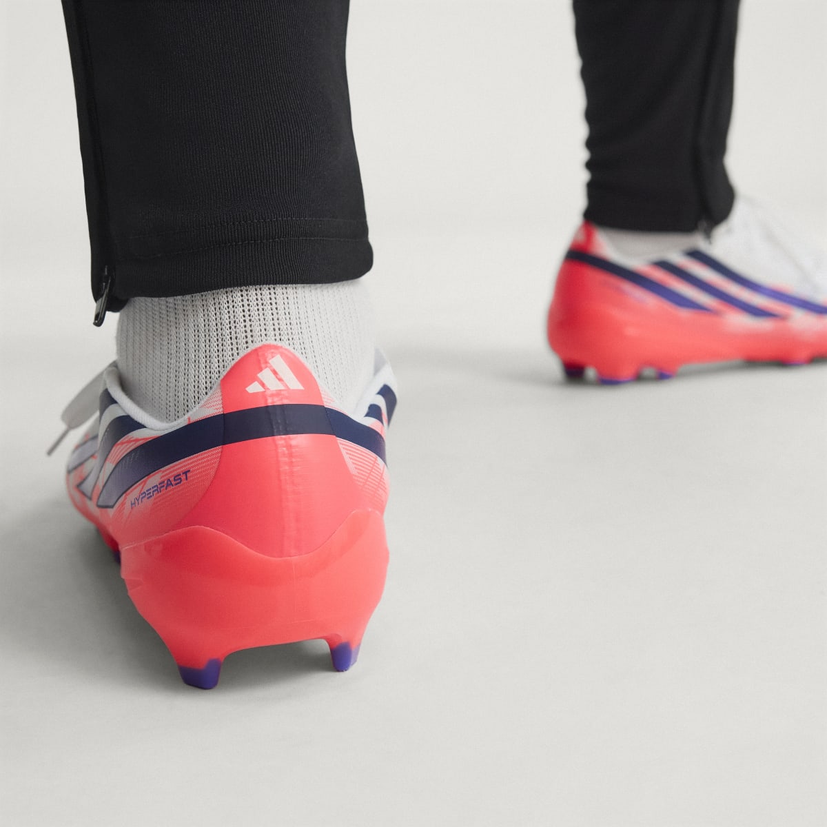 Adidas Women's F50 Hyperfast League Firm Ground Soccer Cleats - Cloud White / Solar Purple / Solar Turbo - Image 9