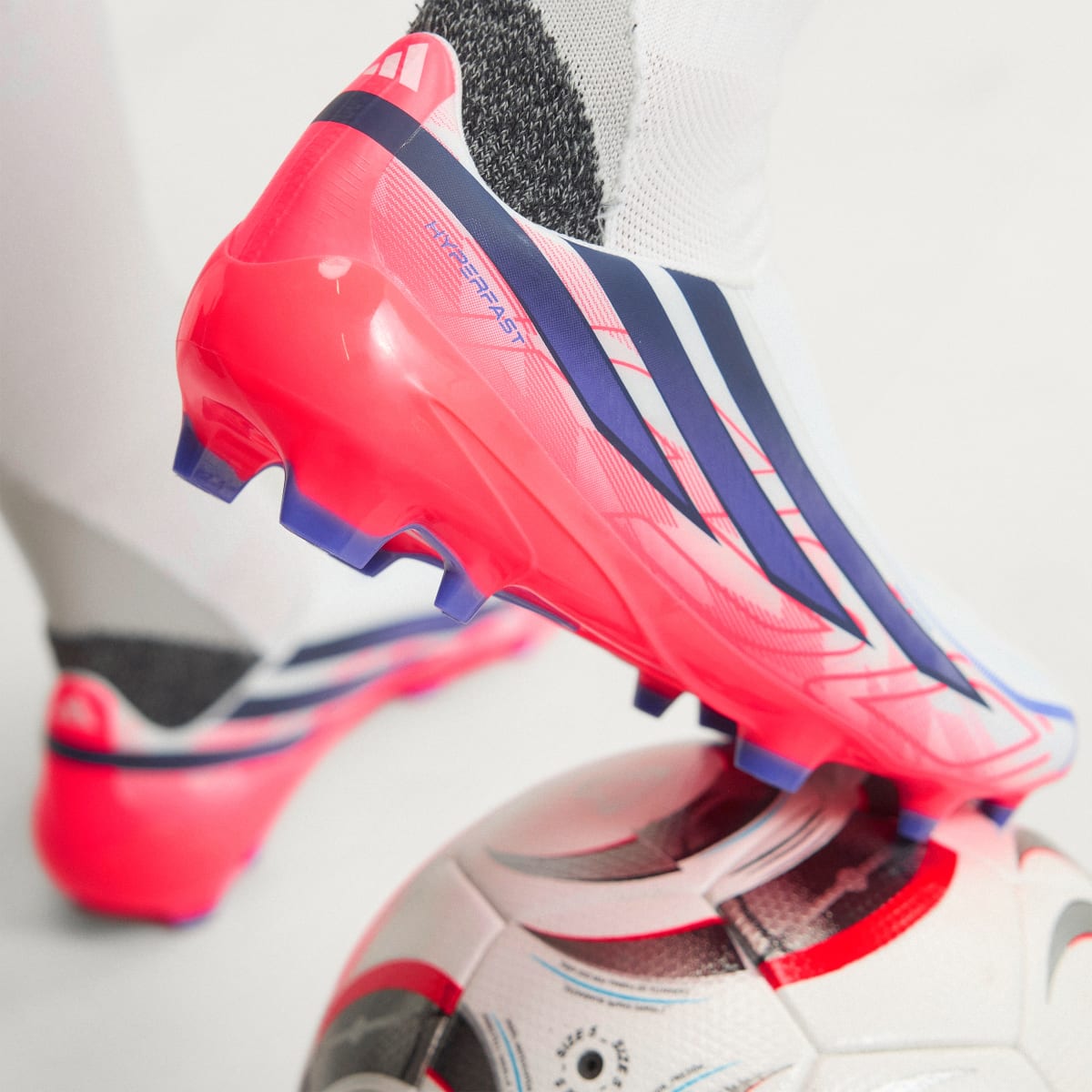 Adidas Men's F50 Hyperfast League Laceless Firm Ground Soccer Cleats - Cloud White / Solar Purple / Solar Turbo - Image 8