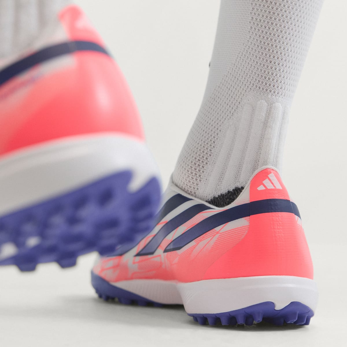 Adidas Women's F50 Hyperfast League Laceless Turf Soccer Cleats - Cloud White / Solar Purple / Solar Turbo - Image 9