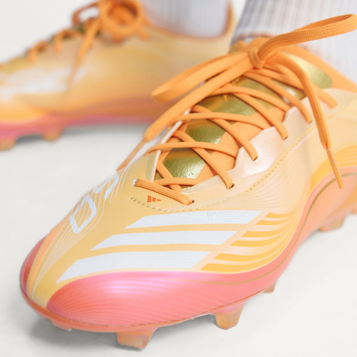 Adidas Men's F50 MESSI ELITE Firm Ground Soccer Cleats - Ice Tangerine / Gold Metallic / Pure Tangerine - Image 6
