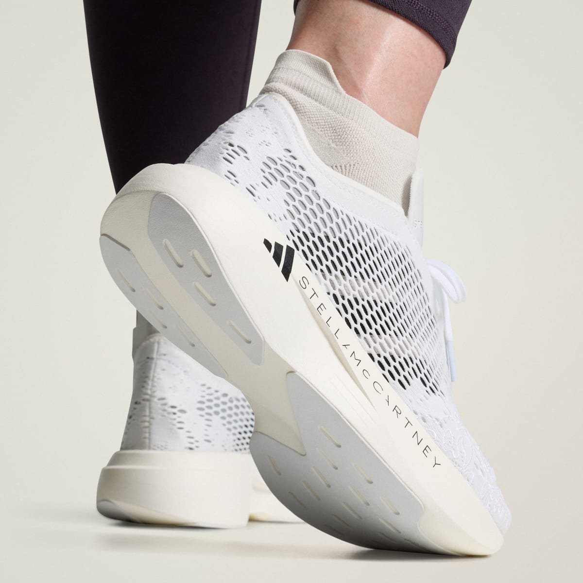 Adidas Women's adidas by Stella McCartney ADIZERO EVO SL Shoes - Cloud White / Core Black / Reflective Silver - Image 1